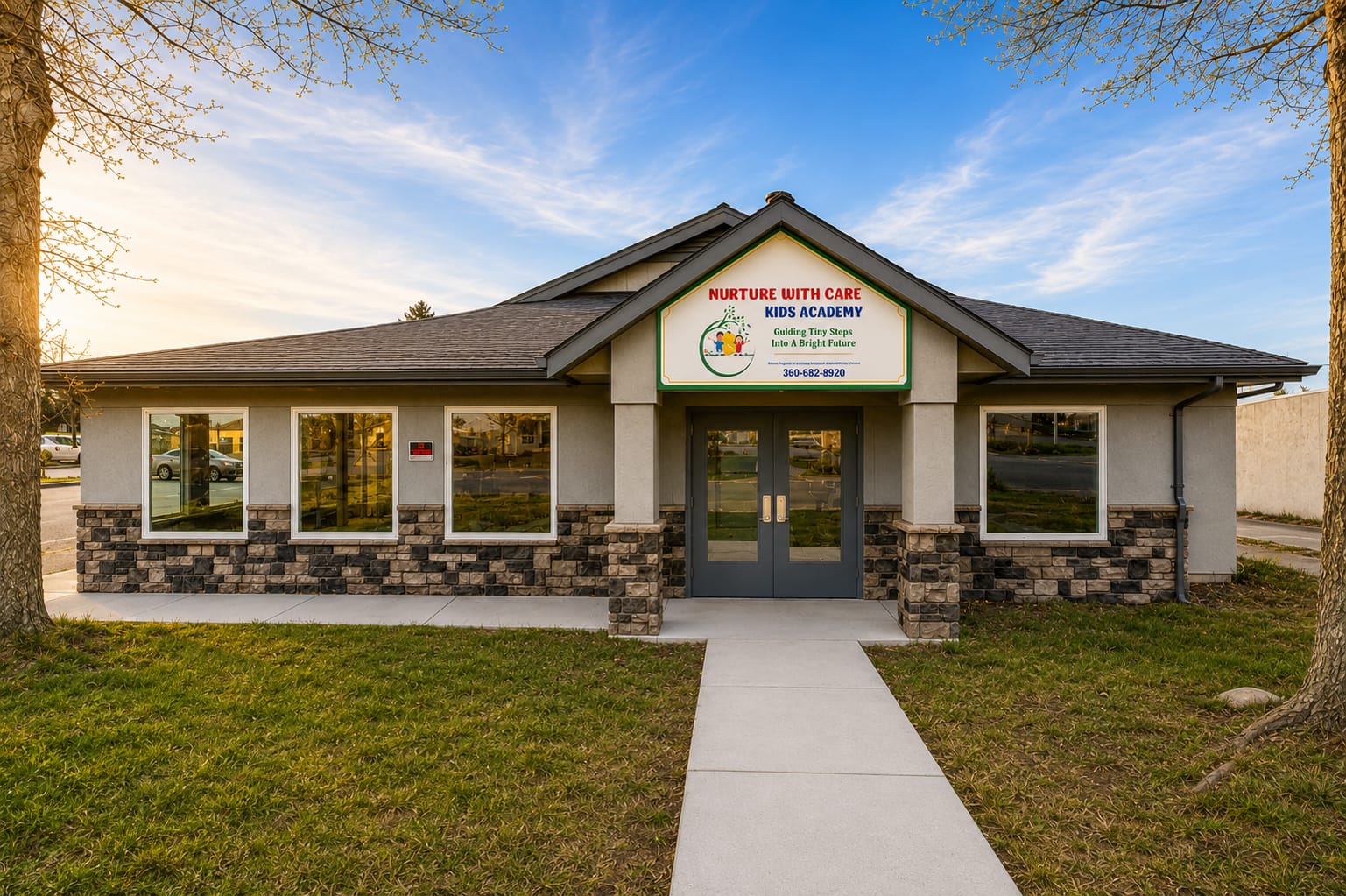 Front entrance of our new Midway Blvd location in Oak Harbor, with NURTURE WITH CARE KIDS ACADEMY signage