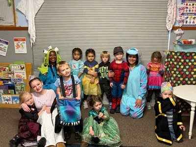 Kids in creative Halloween costumes at Oak Harbor daycare
